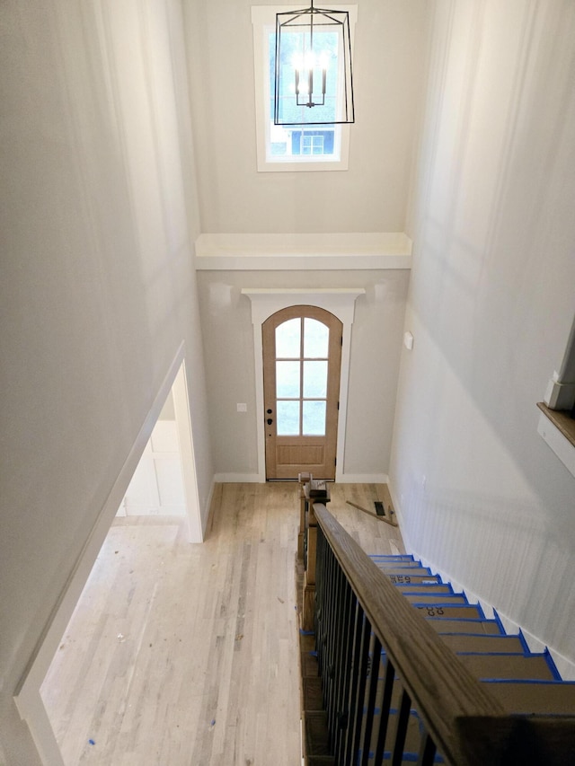 foyer entrance with light wood-type flooring