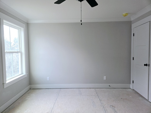 spare room with ceiling fan