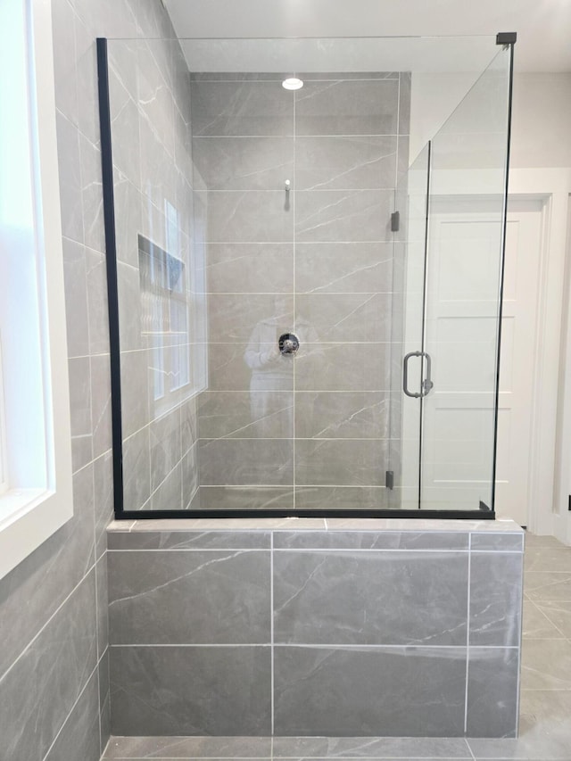 bathroom featuring walk in shower