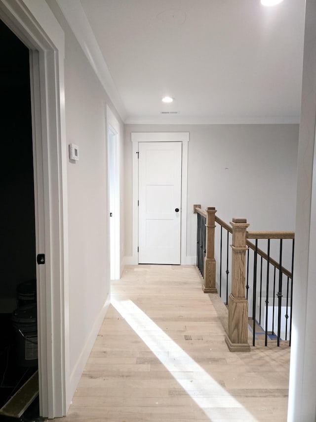 corridor featuring light hardwood / wood-style flooring