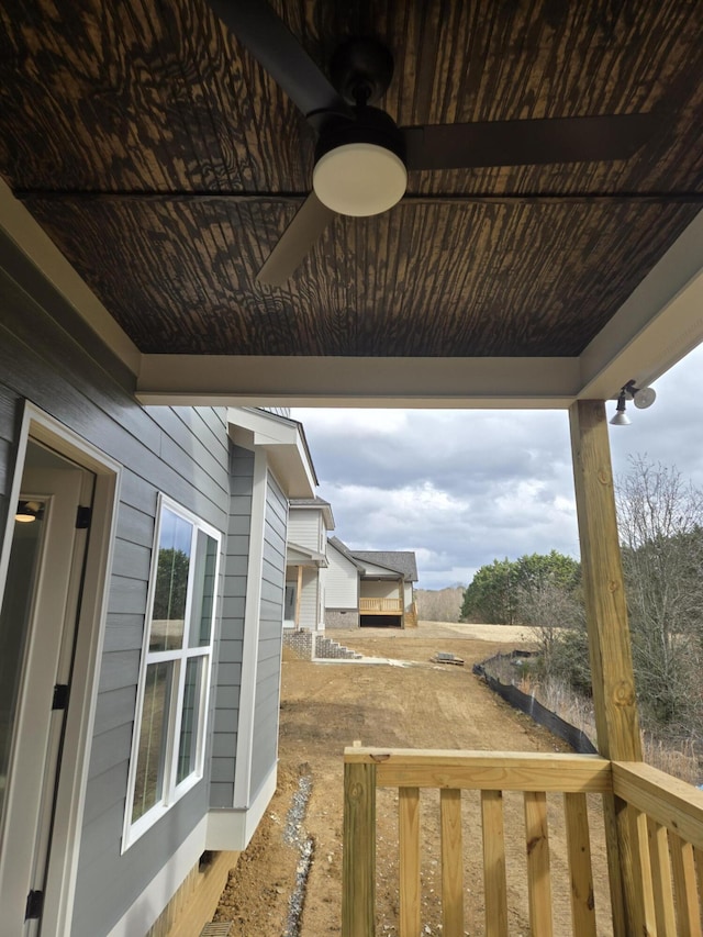 view of yard with ceiling fan