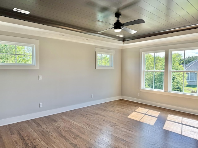 283 Quartz Dr Unit 22, Chickamauga, GA 30707 - spare room with baseboards, wood finished floors, ceiling fan, a raised ceiling, and wooden ceiling