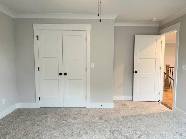 283 Quartz Dr Unit 22, Chickamauga, GA 30707 - unfurnished bedroom featuring carpet floors, a closet, ornamental molding, and baseboards