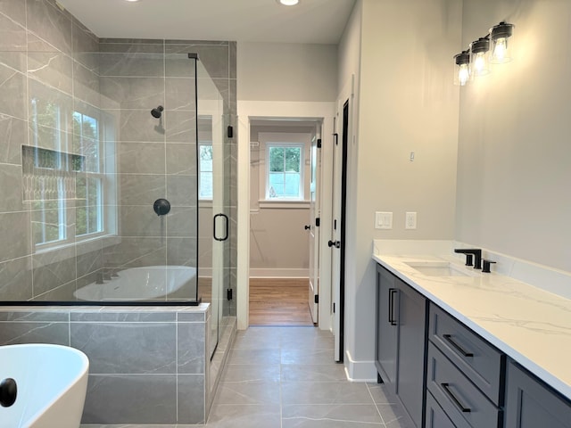 283 Quartz Dr Unit 22, Chickamauga, GA 30707 - full bath with a freestanding tub, a stall shower, vanity, baseboards, and recessed lighting