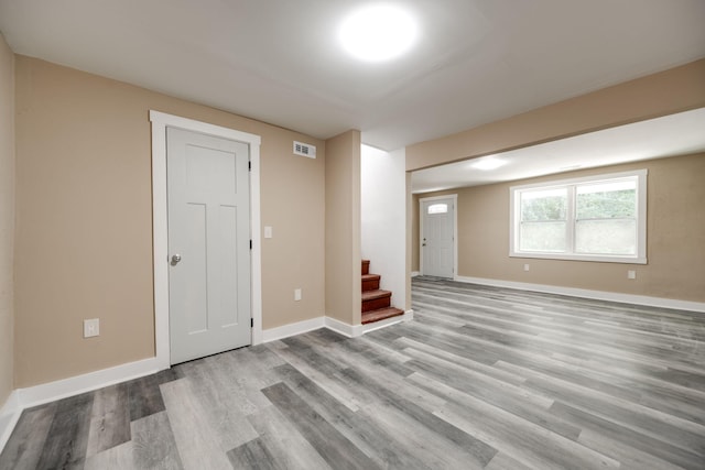 spare room featuring light hardwood / wood-style floors