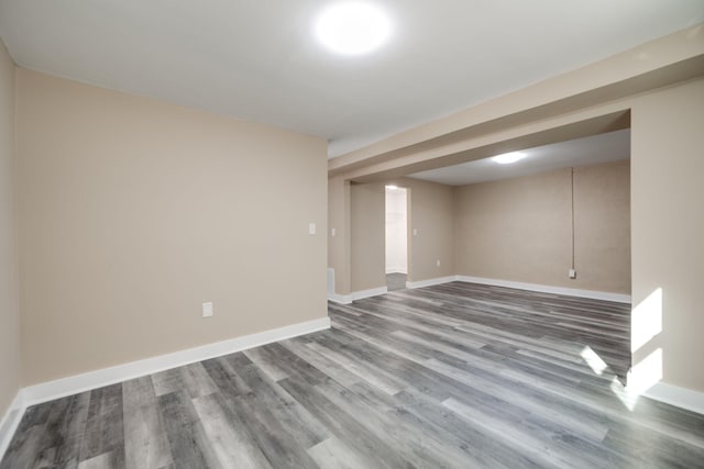 unfurnished room featuring hardwood / wood-style flooring