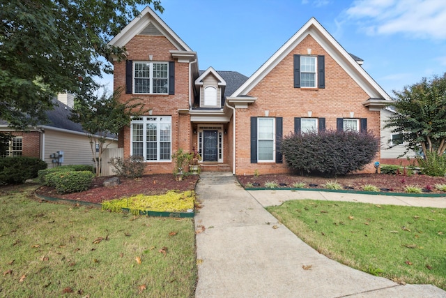 view of front property featuring a front lawn