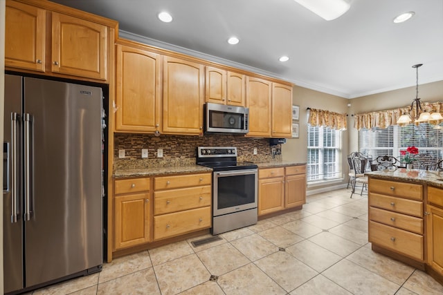 kitchen featuring light tile patterned floors, stone countertops, decorative light fixtures, appliances with stainless steel finishes, and crown molding