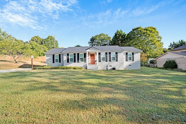 view of front of property with a front lawn