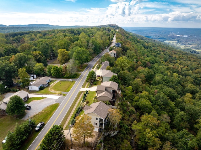 aerial view with a residential view and a view of trees