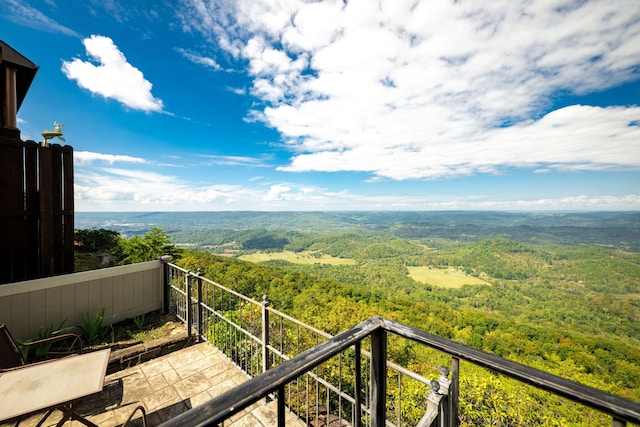 balcony with a forest view