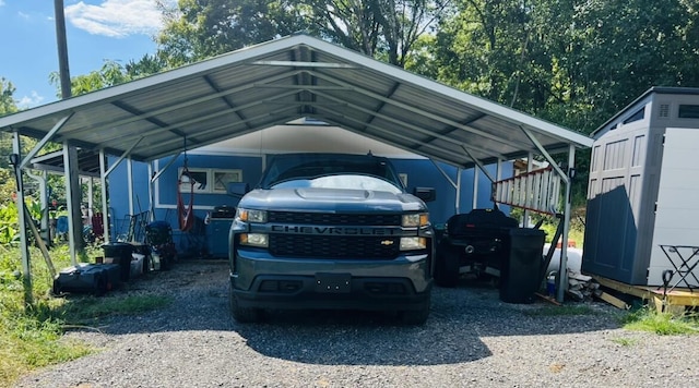 view of parking / parking lot featuring a carport