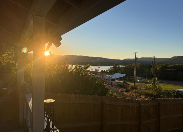 exterior space featuring a water and mountain view