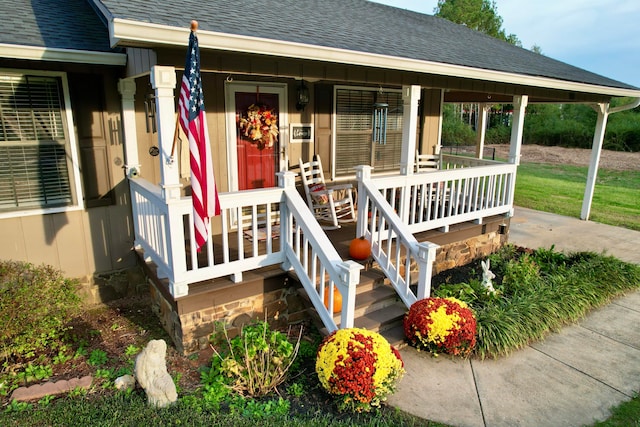 doorway to property featuring a porch