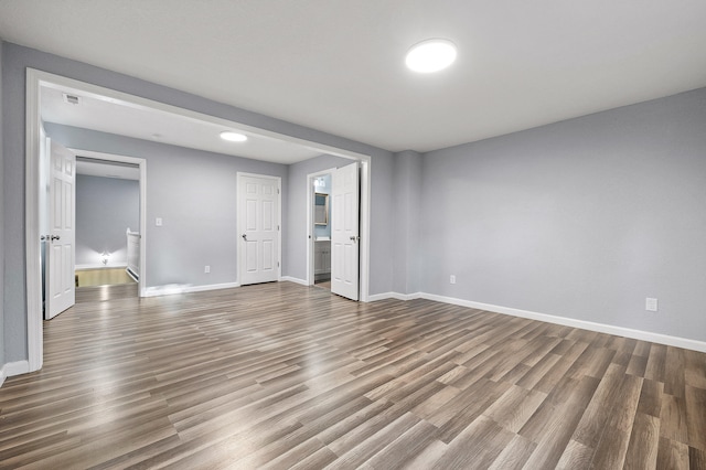 unfurnished bedroom featuring wood-type flooring