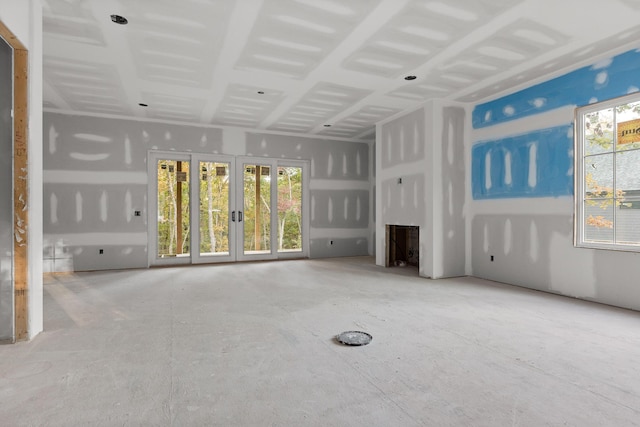 unfurnished living room featuring a fireplace