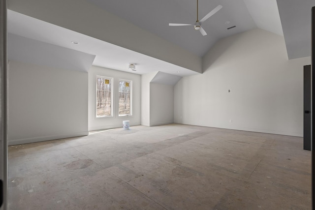 additional living space featuring ceiling fan and vaulted ceiling