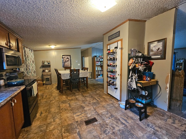 dining area with a textured ceiling