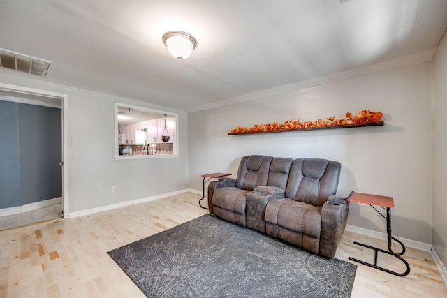 living room with hardwood / wood-style flooring