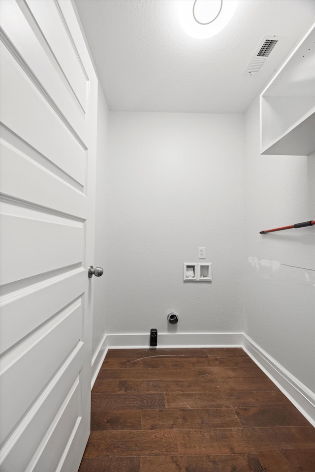 laundry area with hookup for a washing machine and dark hardwood / wood-style floors