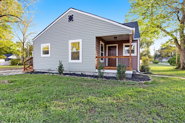 exterior space with a front yard and a porch