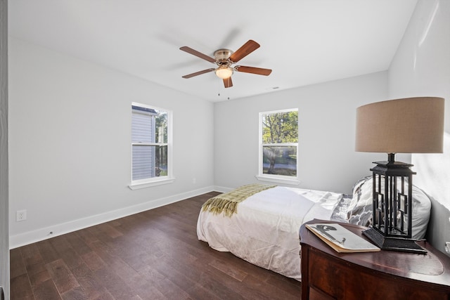 bedroom featuring dark wood-type flooring and ceiling fan