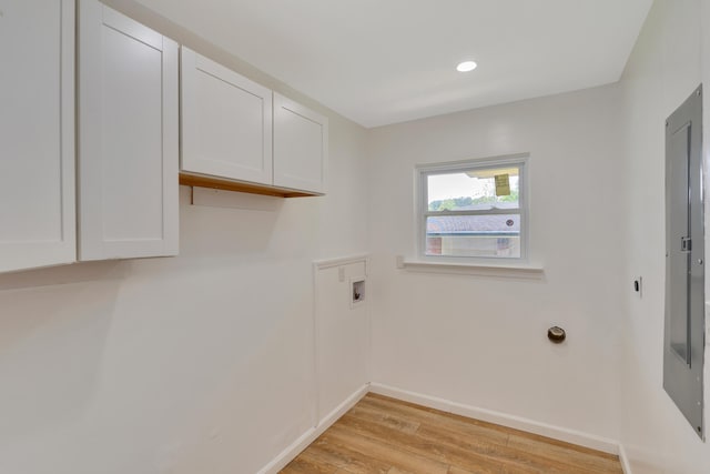 laundry room featuring cabinet space, light wood finished floors, hookup for a washing machine, recessed lighting, and baseboards
