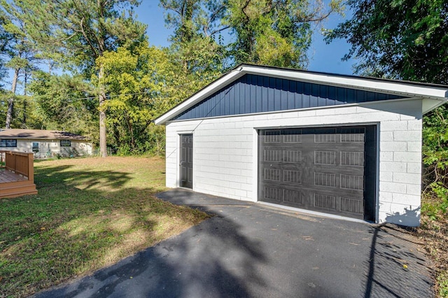 garage with a yard