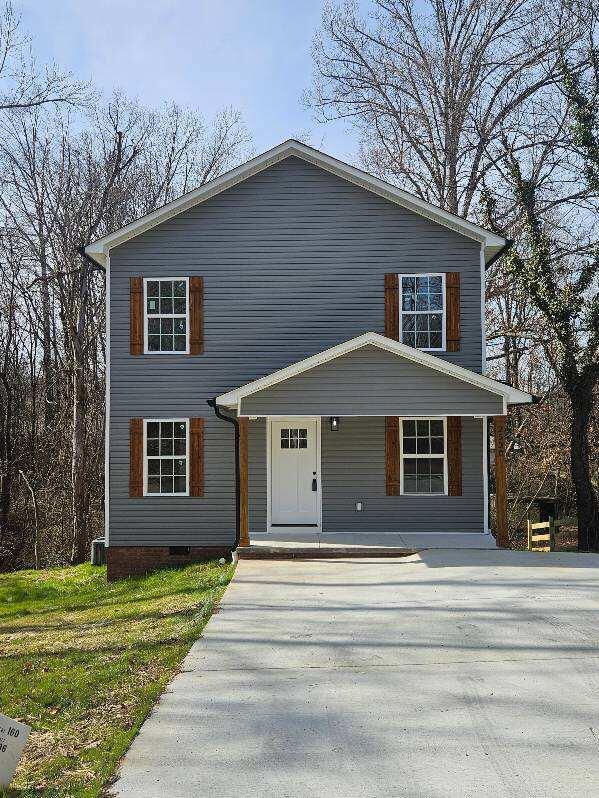 view of property with covered porch