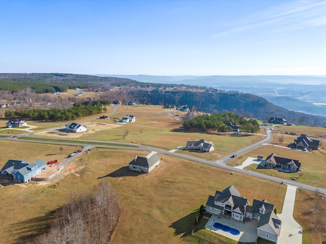 bird's eye view with a mountain view