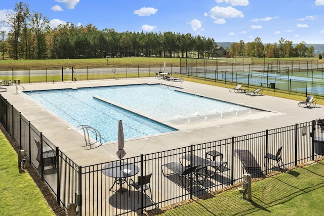 community pool with fence