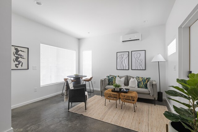 living room featuring a wall mounted air conditioner