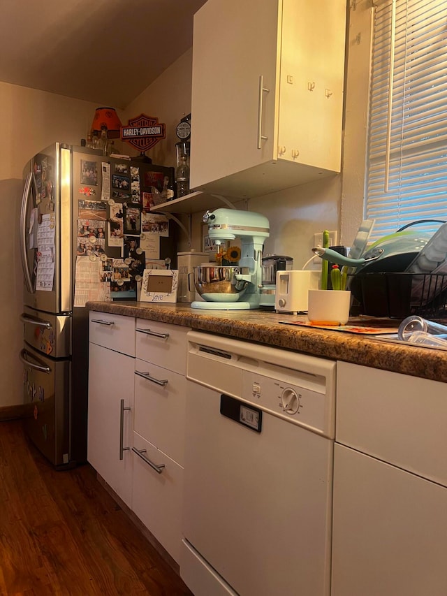 kitchen with dark hardwood / wood-style flooring, white cabinetry, and dishwasher