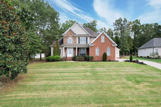 view of front of house featuring a front lawn