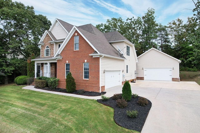 craftsman house with a garage and a front lawn