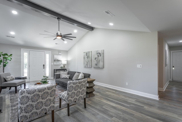 living room with dark wood-type flooring, lofted ceiling with beams, and ceiling fan