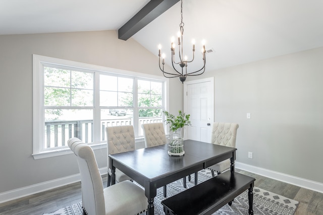 dining area with dark hardwood / wood-style floors, vaulted ceiling with beams, and a wealth of natural light