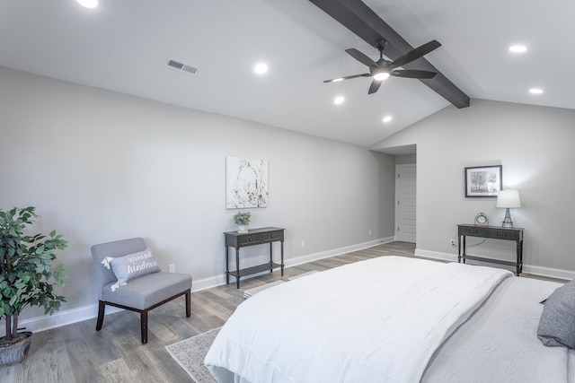 bedroom with wood-type flooring, vaulted ceiling with beams, and ceiling fan