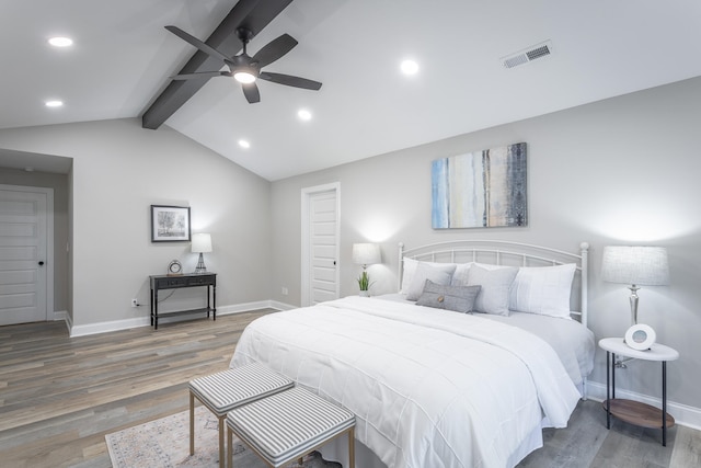 bedroom featuring lofted ceiling with beams, ceiling fan, and dark hardwood / wood-style floors