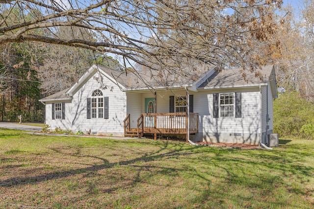 ranch-style house featuring a front yard