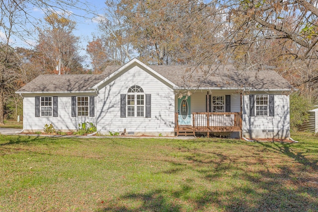 ranch-style house with covered porch and a front lawn