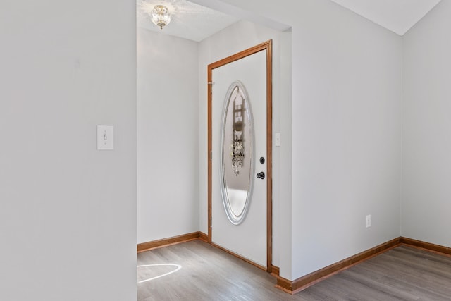 entryway with light hardwood / wood-style floors