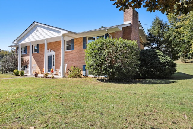 view of front of property with a front lawn