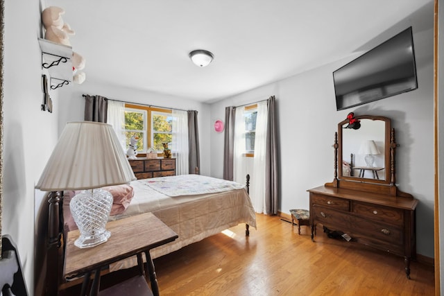 bedroom featuring light wood-type flooring