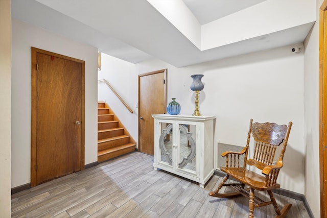 living area featuring light hardwood / wood-style floors