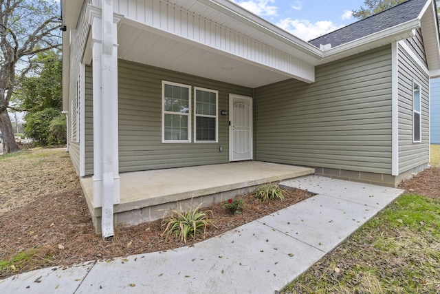 doorway to property with a porch