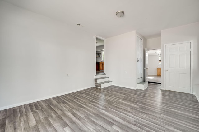 unfurnished bedroom featuring wood-type flooring