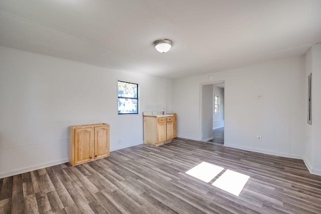 unfurnished room with light hardwood / wood-style flooring