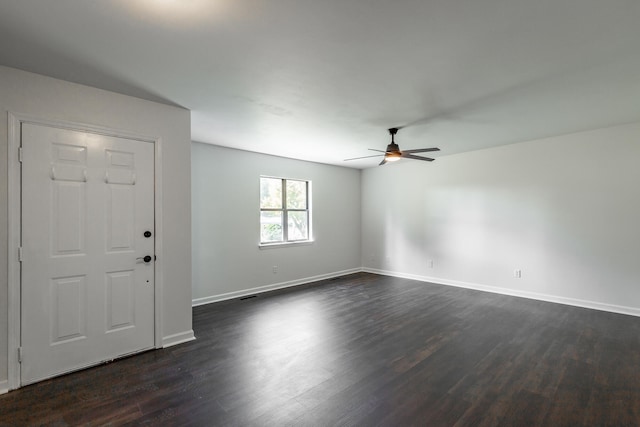 foyer featuring ceiling fan and dark hardwood / wood-style flooring