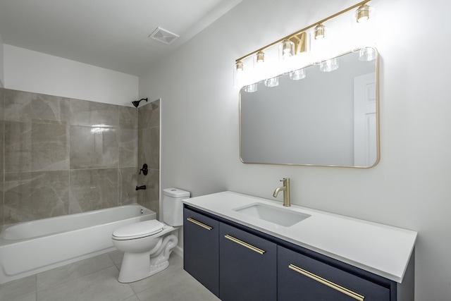 full bathroom with vanity, tiled shower / bath combo, toilet, and tile patterned floors